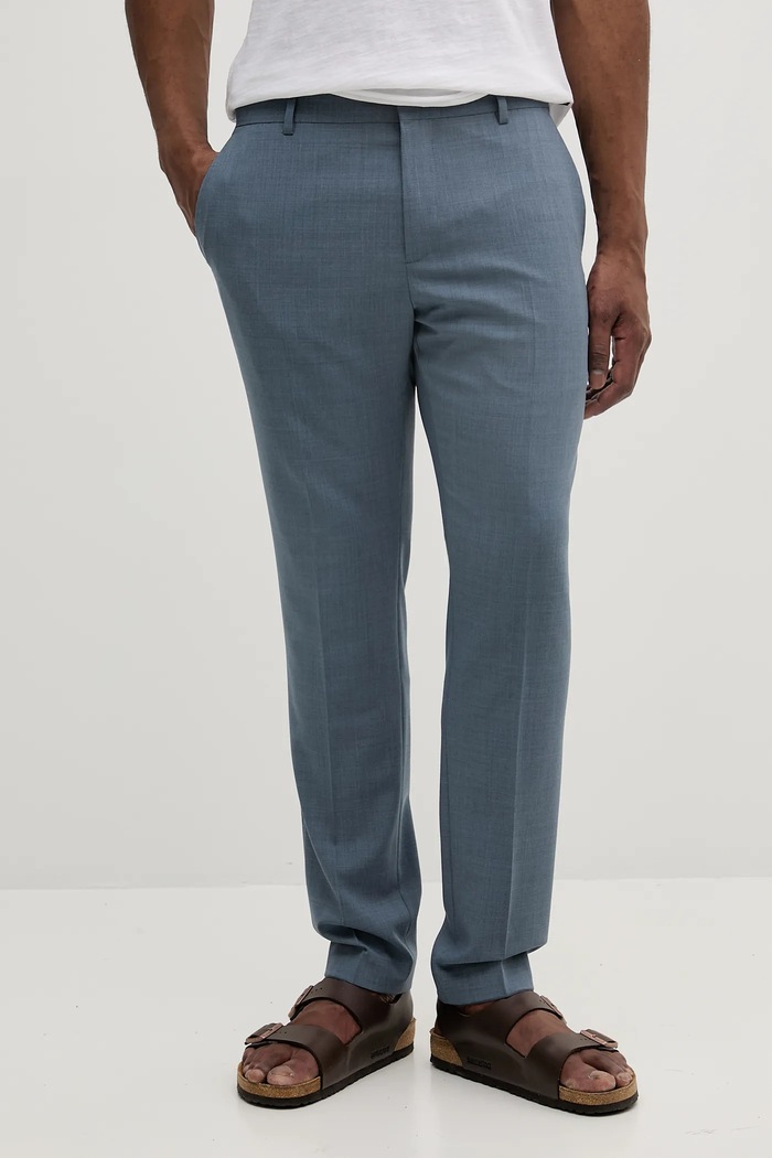 Calvin Klein spodnie z domieszką wełny z elastanem niebieski K10K113949