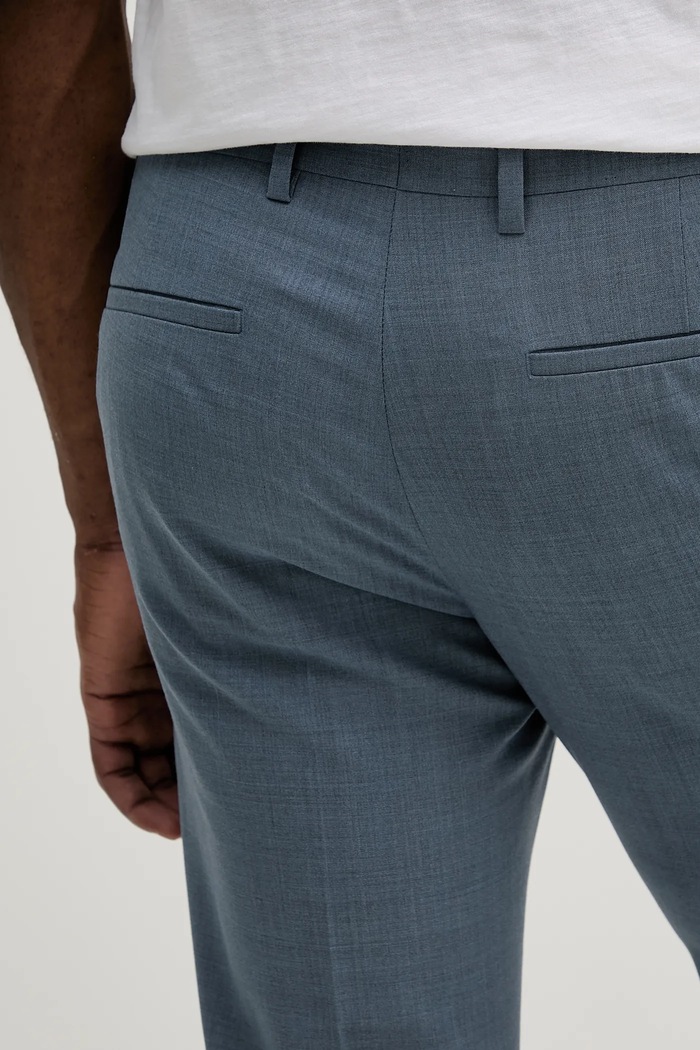 Calvin Klein spodnie z domieszką wełny niebieski K10K113949