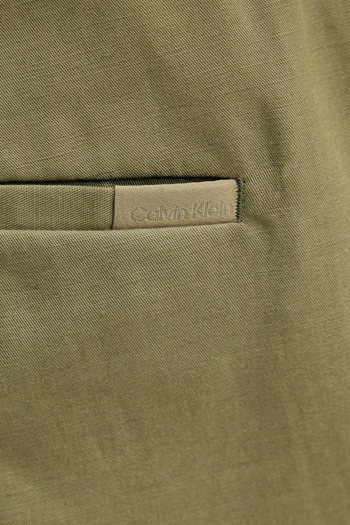 Oblečenie Nohavice s prímesou ľanu Calvin Klein K10K114403 zelená
