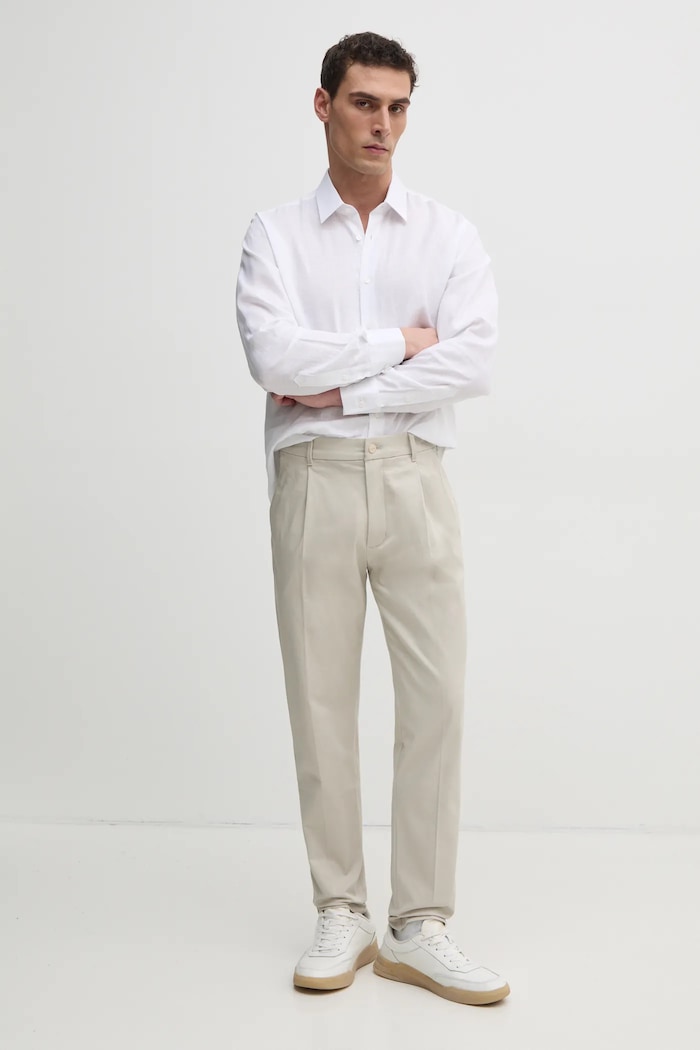 Calvin Klein spodnie K10K114104 beżowy SS25