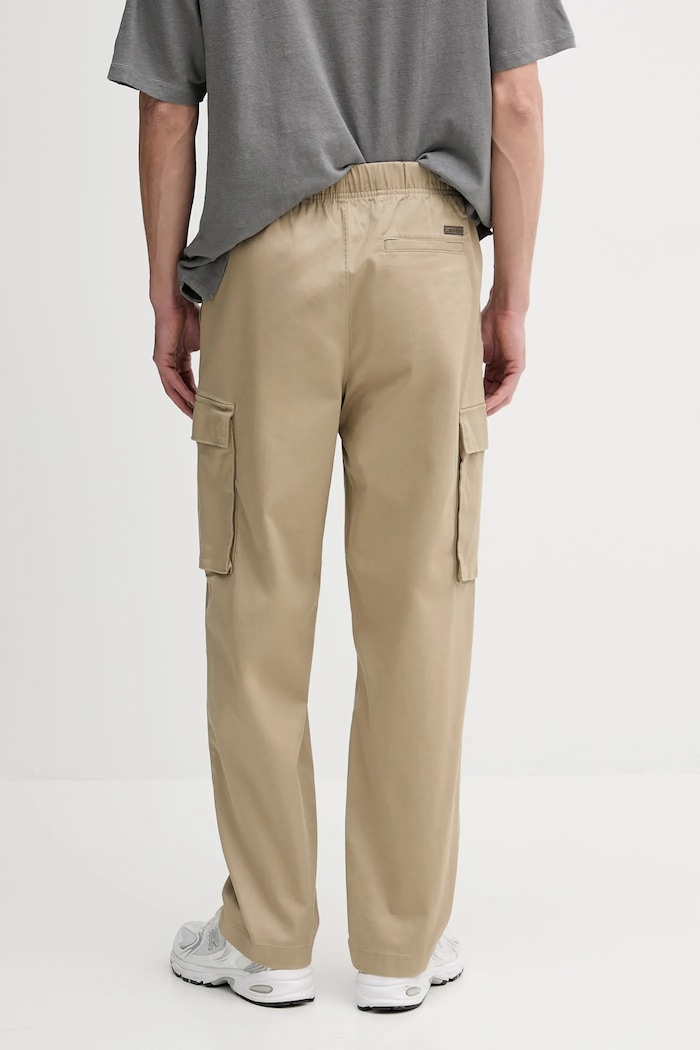 Odzież Calvin Klein Jeans spodnie LV040EM616 beżowy
