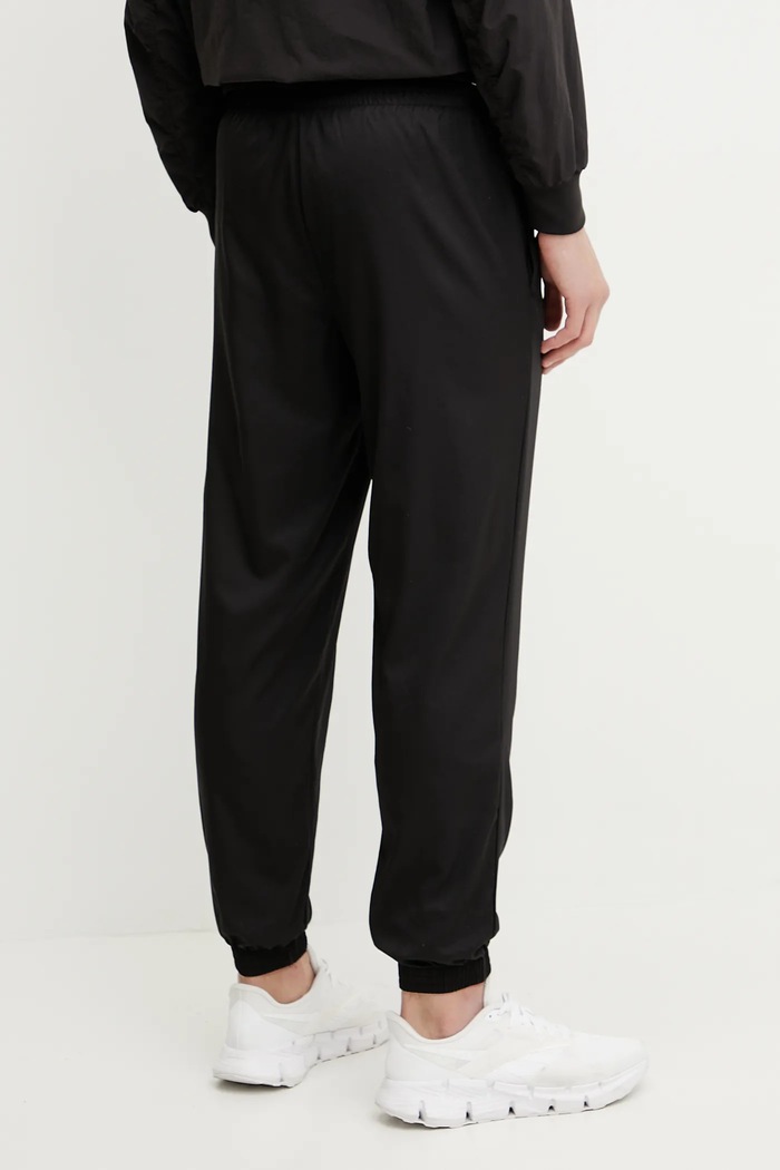 Îmbrăcăminte Puma pantaloni de trening Essential Woven 682622 negru
