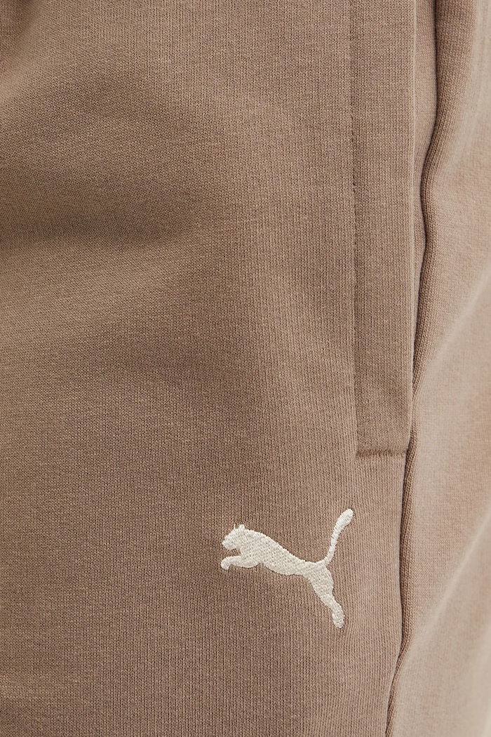 Puma spodnie dresowe Relaxed brązowy 631535