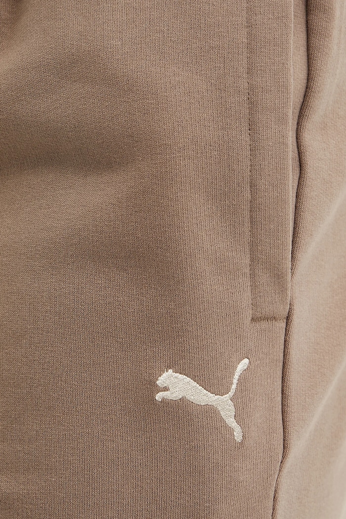 Puma spodnie dresowe Relaxed brązowy 631535