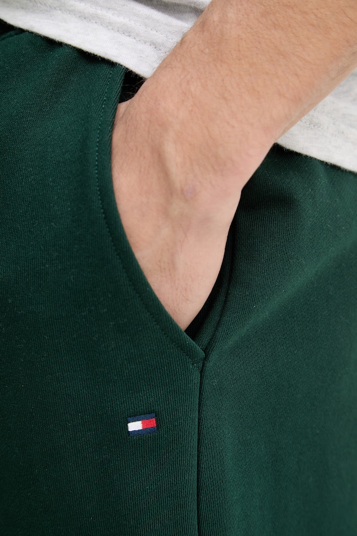 Tommy Hilfiger teplákové nohavice pánske bavlnené zelená MW0MW37236