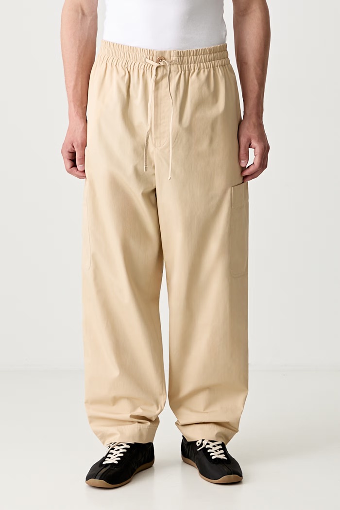 Kenzo spodnie cargo bawełniane męskie gładkie beżowy FF55PA5019SC.11