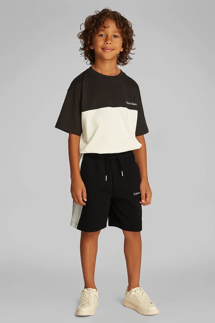 Παιδικό σορτς Calvin Klein Jeans με ελαστάν μαύρο IB0IB02433.104.116.PPYA