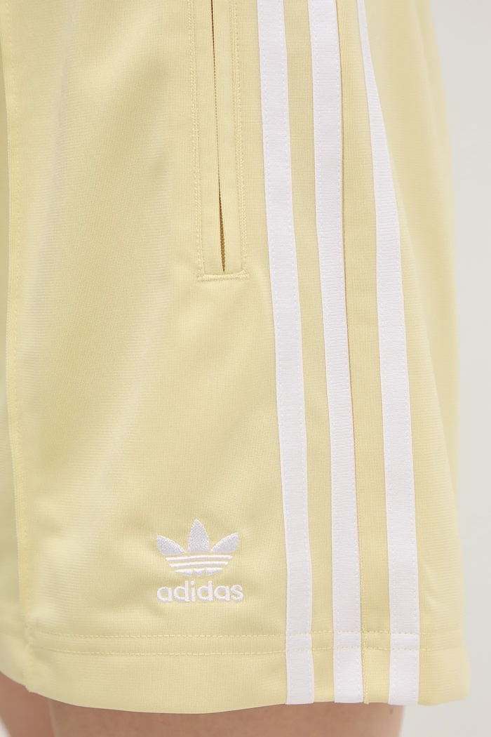 adidas Originals szorty Firebird żółty JD0820