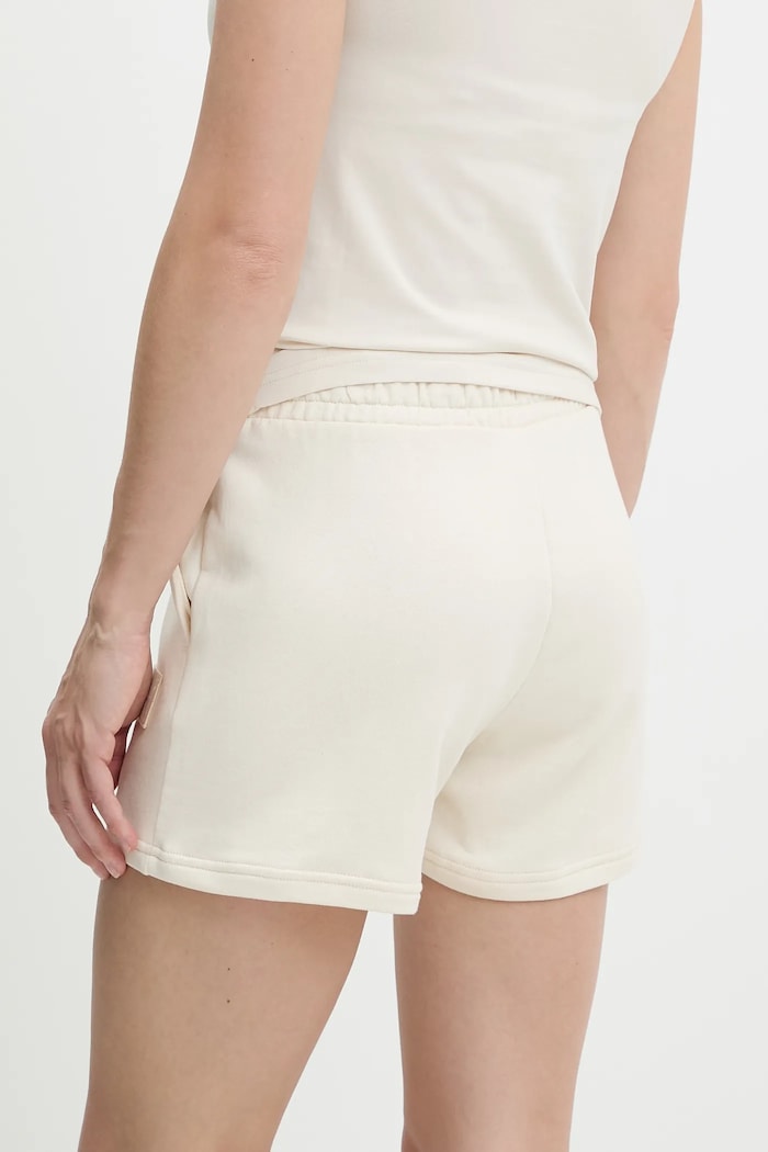 Oblečenie Bavlnené šortky Puma 685020. béžová