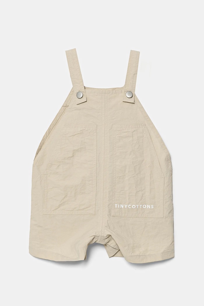 Tinycottons rampe pentru copii SOLID SHORT DUNGAREE bej SS25.254