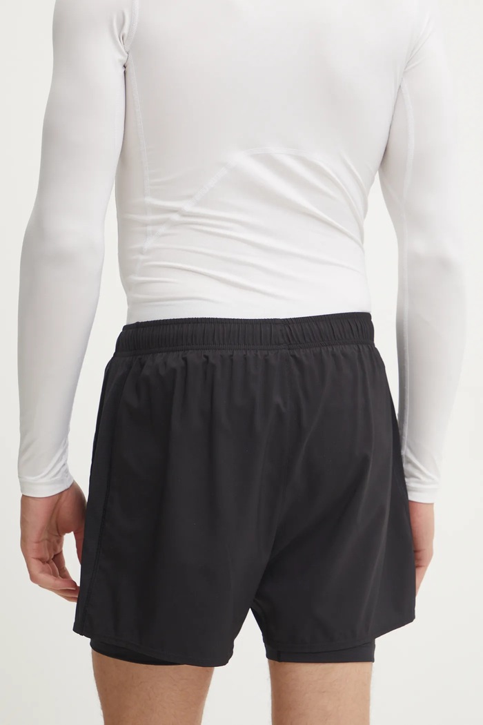 Oblečenie Bežecké šortky Asics Core 2011D218 čierna