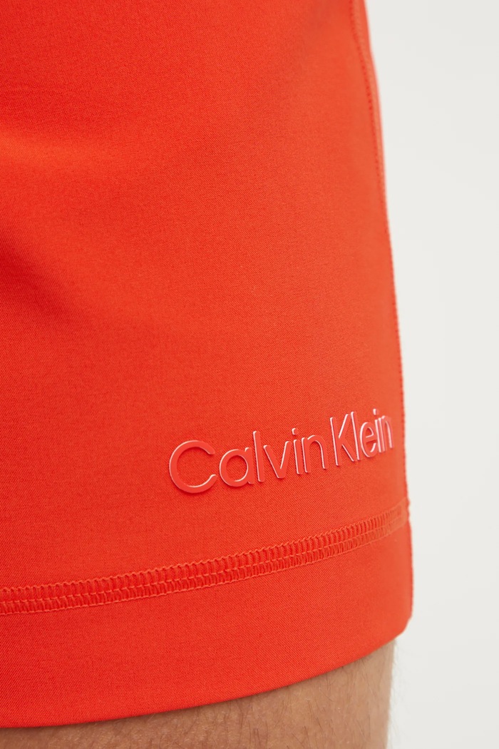 Kratke hlače za vadbo Calvin Klein Performance oranžna LVGMS5S835
