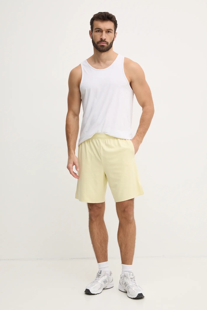 Tréningové šortky Calvin Klein Performance LVGMS5S850 žltá SS25