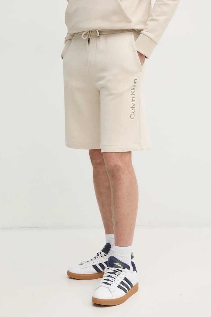Bavlněné šortky Calvin Klein jemný vzor béžová K10K114121