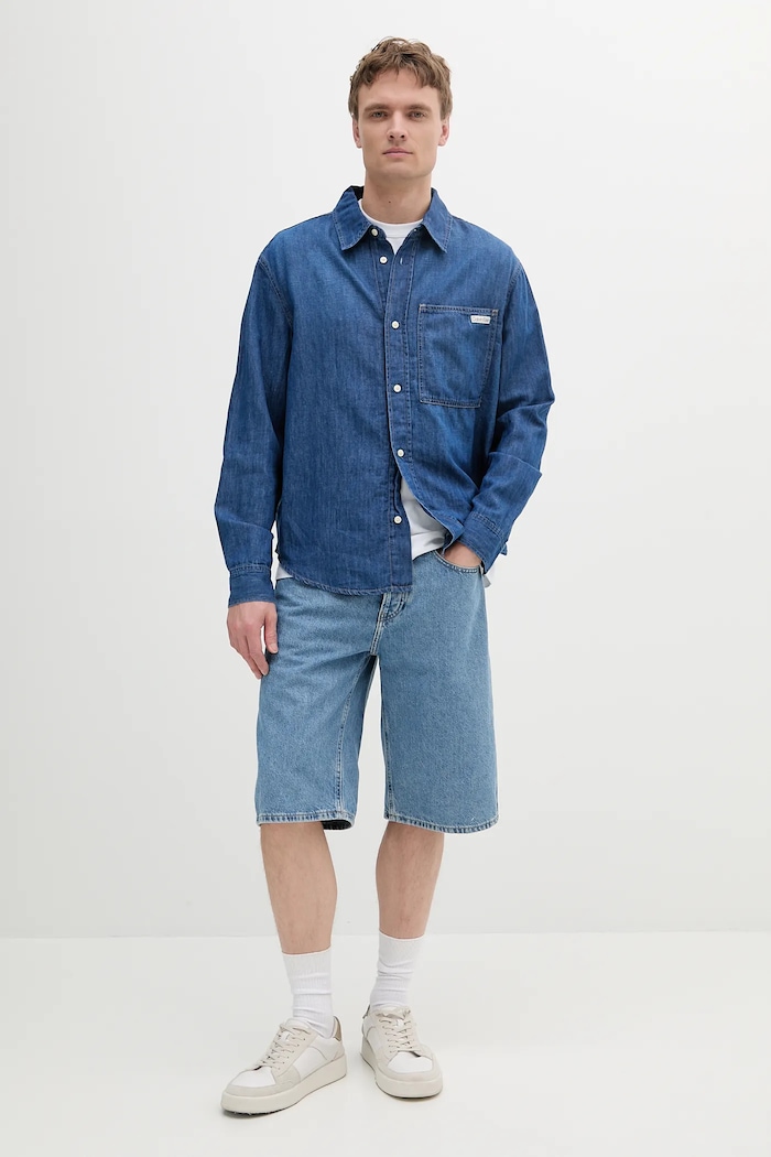 Rifľové krátke nohavice Calvin Klein Jeans J30J327187 modrá SS25