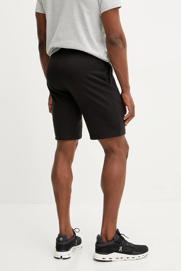 Дрехи Puma къс панталон тип анцуг мъжки от памук Essential Jersey 682600 черен