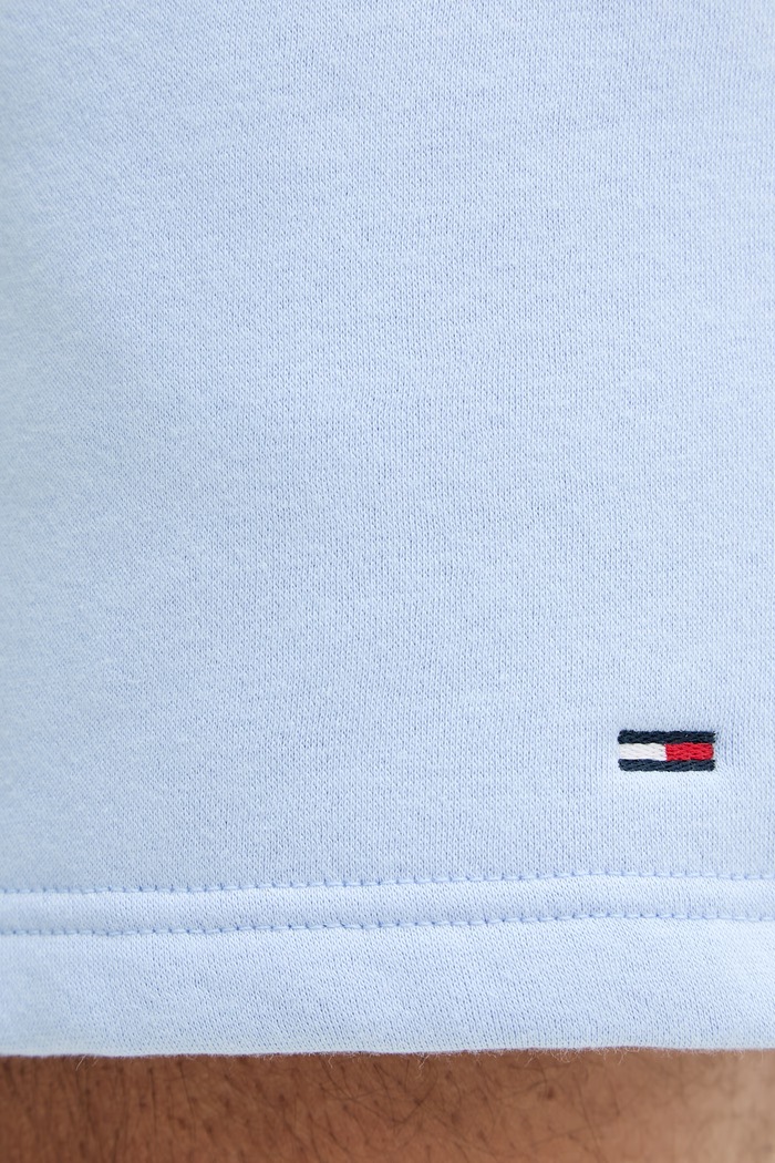 Tommy Jeans teplákové šortky pánske s bavlnou modrá DM0DM21931