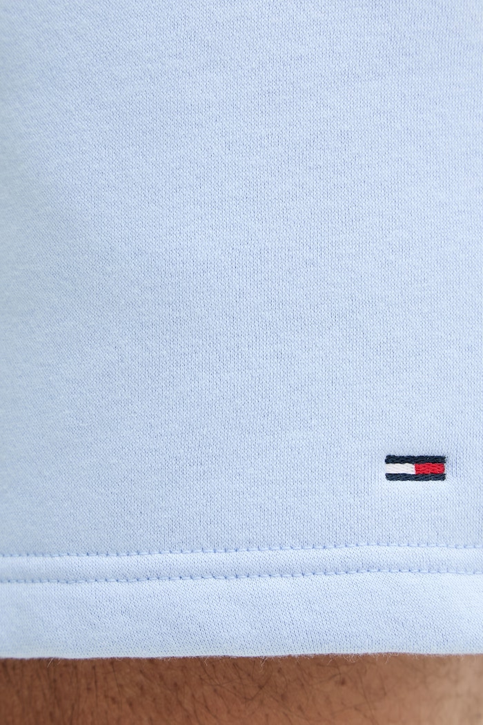 Tommy Jeans teplákové šortky pánske s bavlnou modrá DM0DM21931