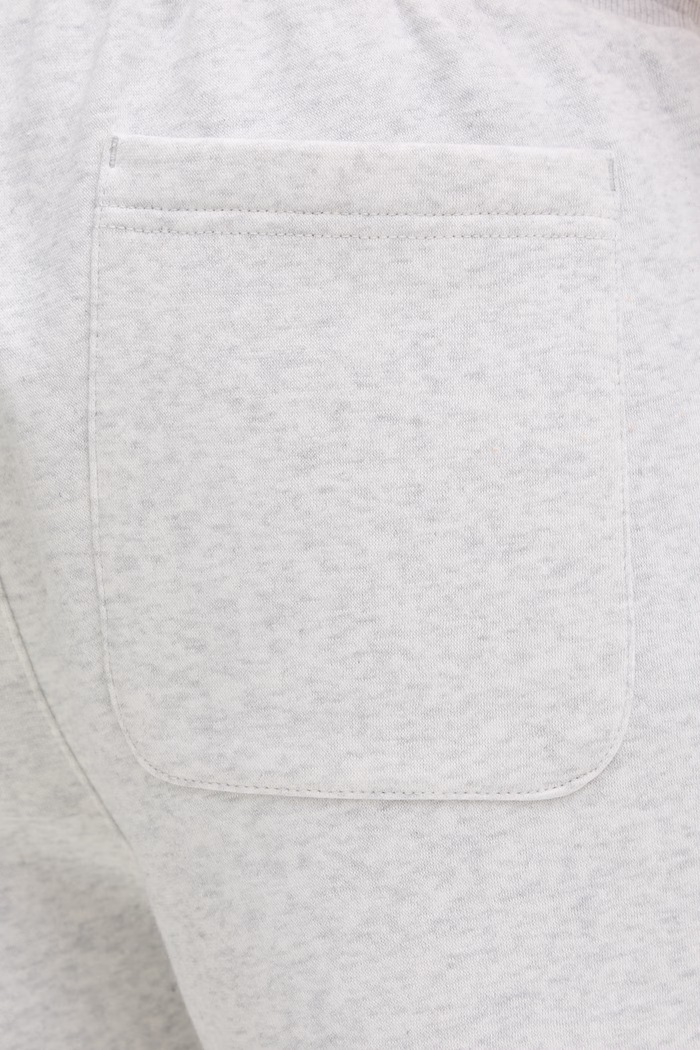 Tommy Jeans teplákové šortky pánske s bavlnou sivá DM0DM21931