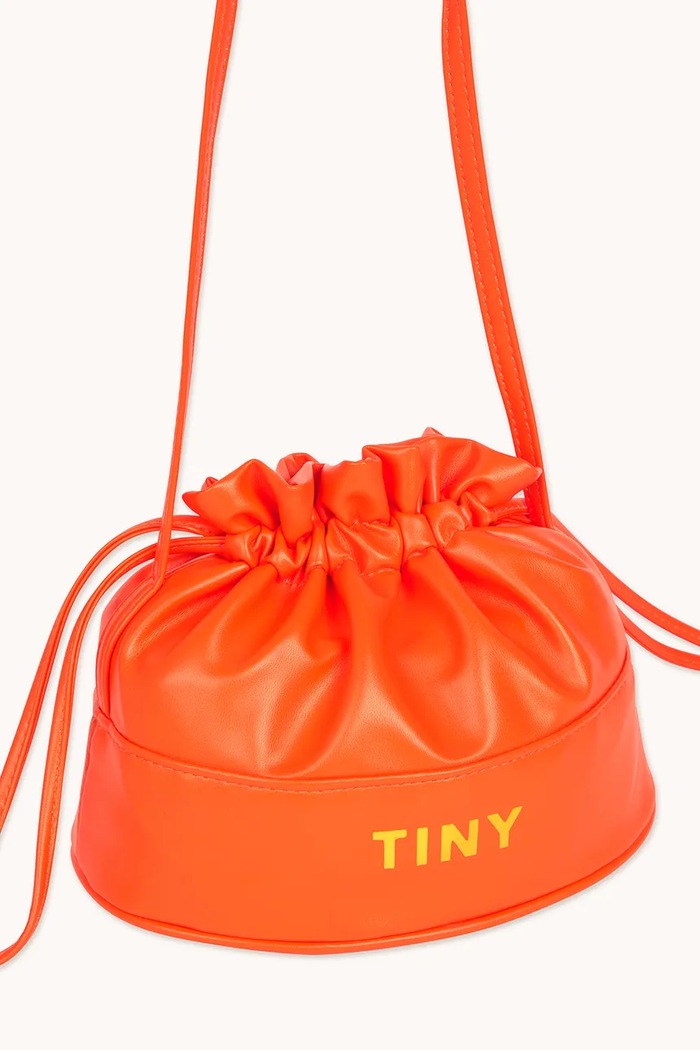 Detská kabelka Tinycottons SOLID BUCKET BAG oranžová SS25.388