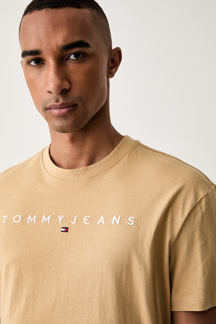 Tommy Jeans tričko pánské bavlněné béžová DM0DM20744