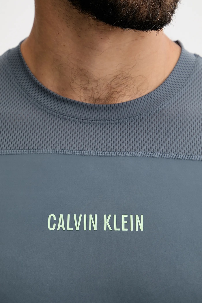 Tréningové tričko Calvin Klein Performance LVGMS5K188 sivá
