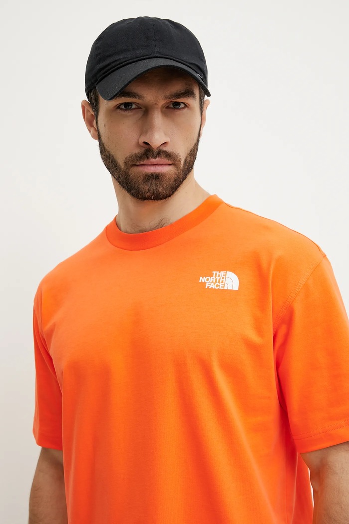 Дрехи Памучна тениска The North Face Nuptse Oversized NF0A8C3T6HI1 оранжев