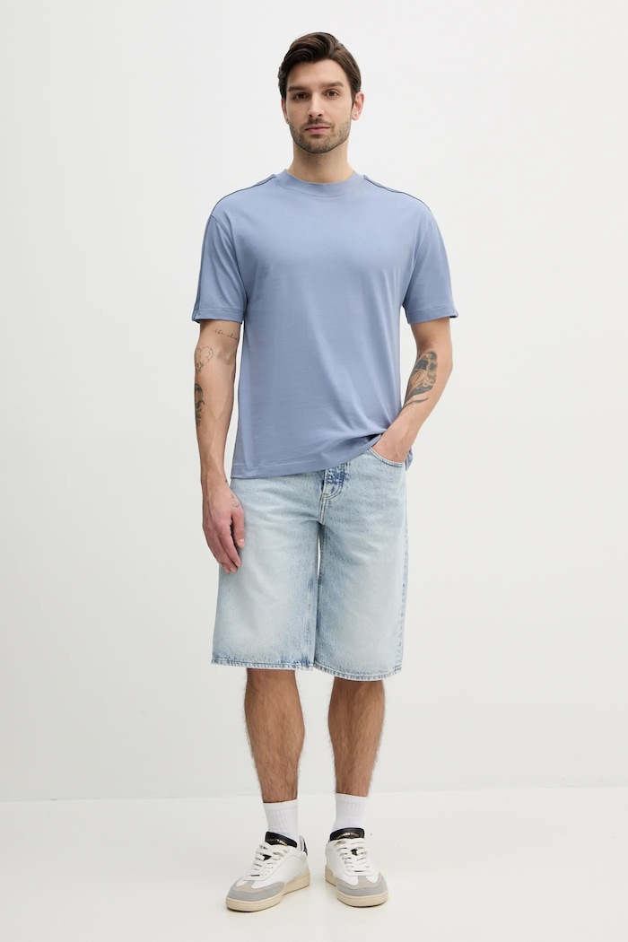 Bavlněné tričko Calvin Klein Jeans J30J327237 modrá SS25