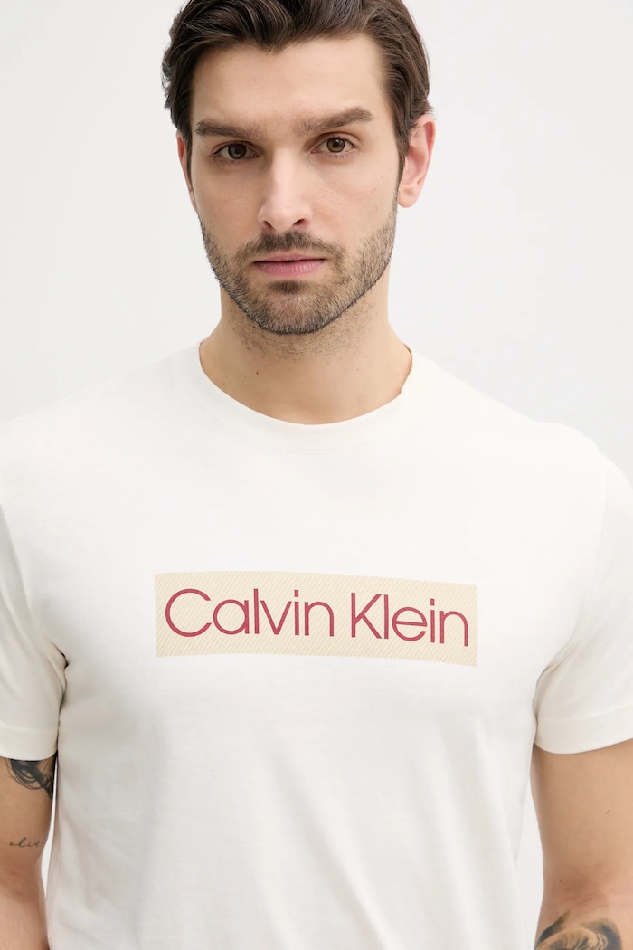 Bavlněné tričko Calvin Klein Jeans potisk béžová J30J327472