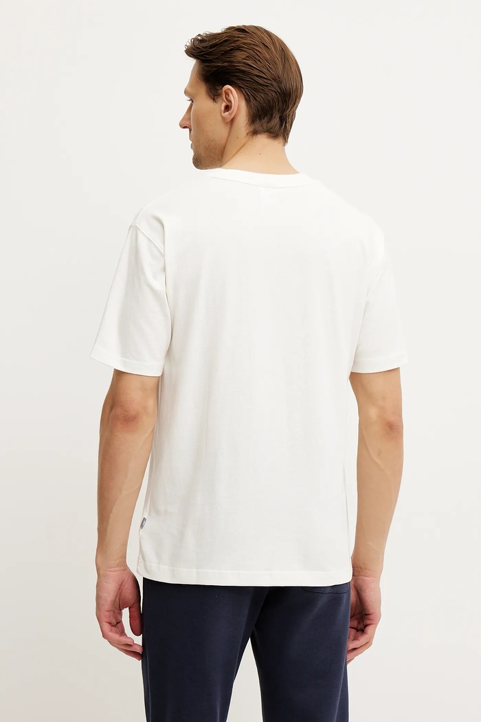 Odzież New Balance t-shirt bawełniany MT43556SST beżowy