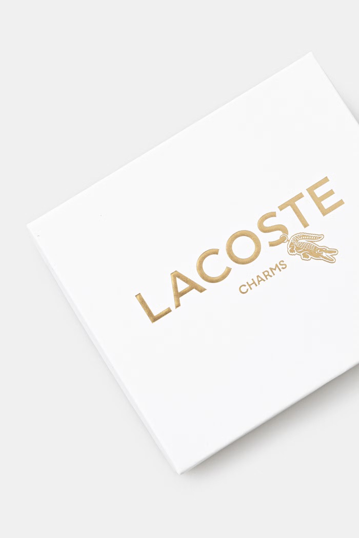 Doplňky Lacoste klíčenka dámská bez kamene NF5229RL růžová