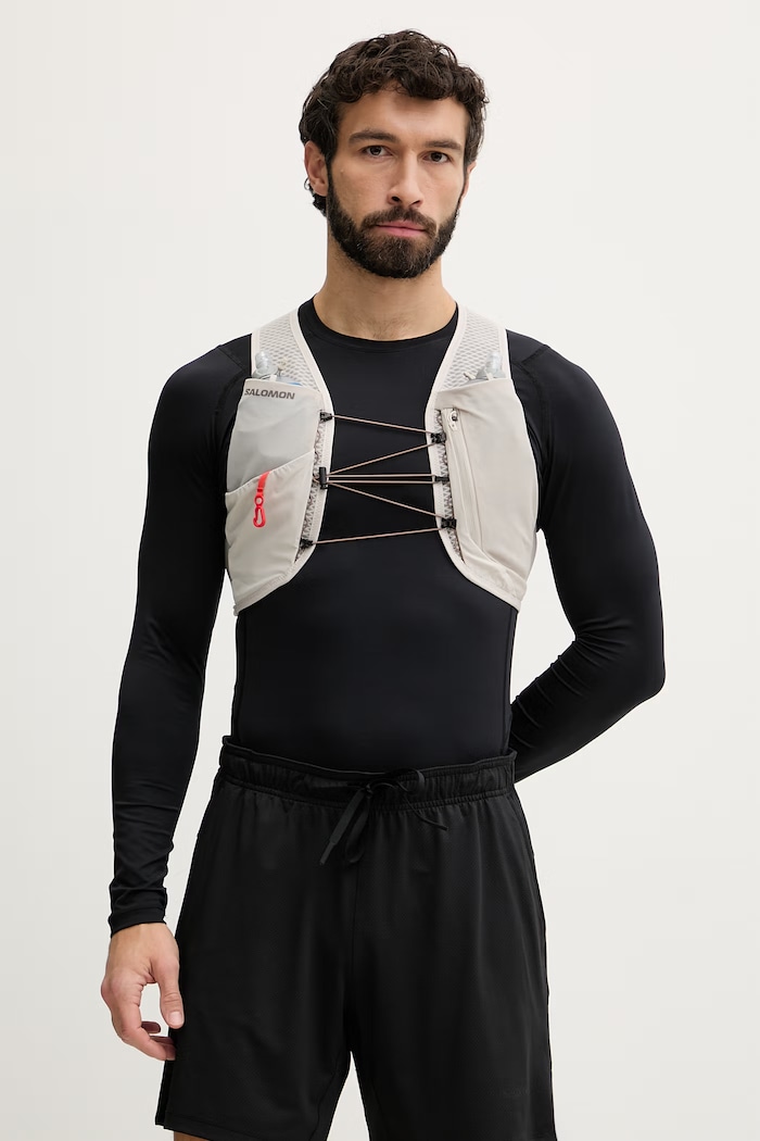 Salomon běžecká vesta GRVL SKIN LC2854900 béžová SS26