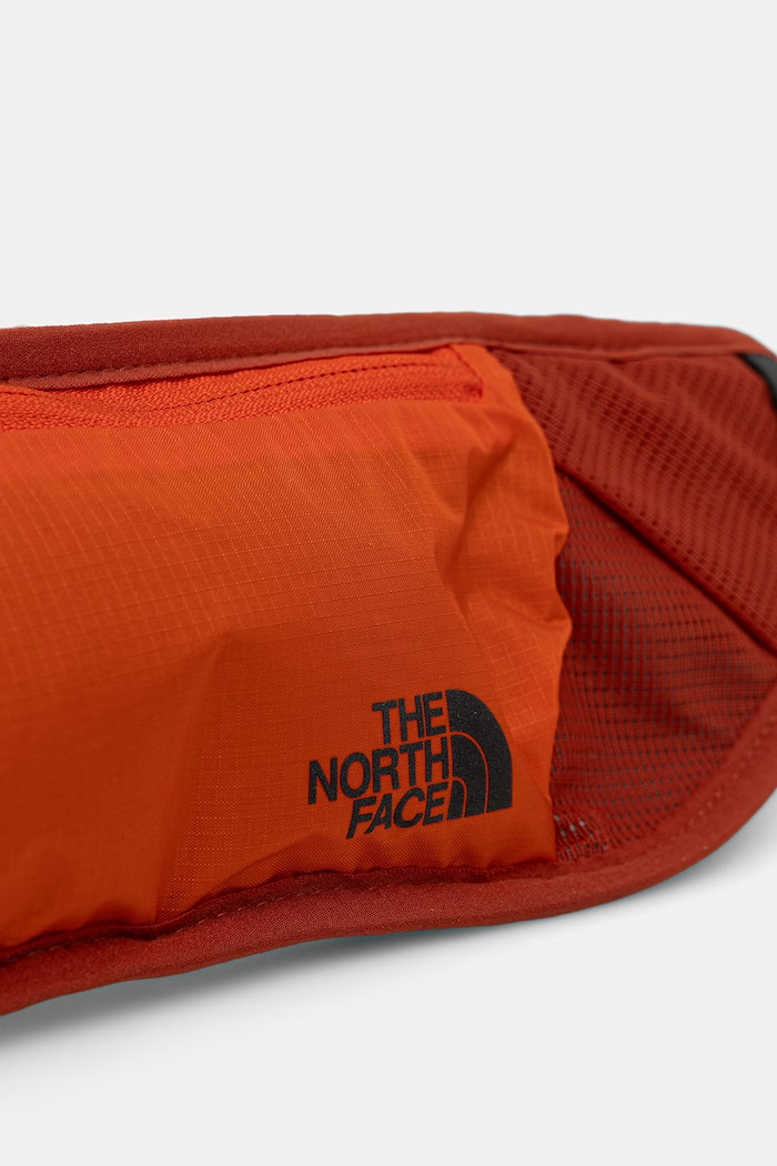 The North Face pas biegowy Sunriser pomarańczowy NF0A81E2JY01