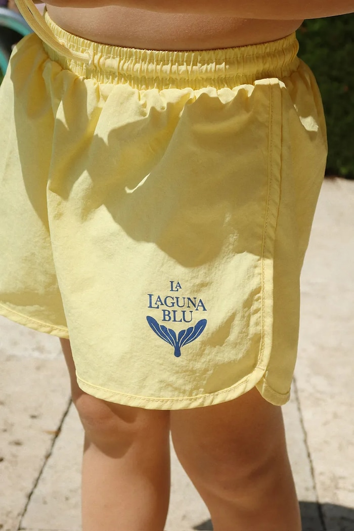 Konges Sløjd szorty kąpielowe dziecięce POMIO SWIM SHORTS GRS Planet friendly żółty KS105041.PPY2