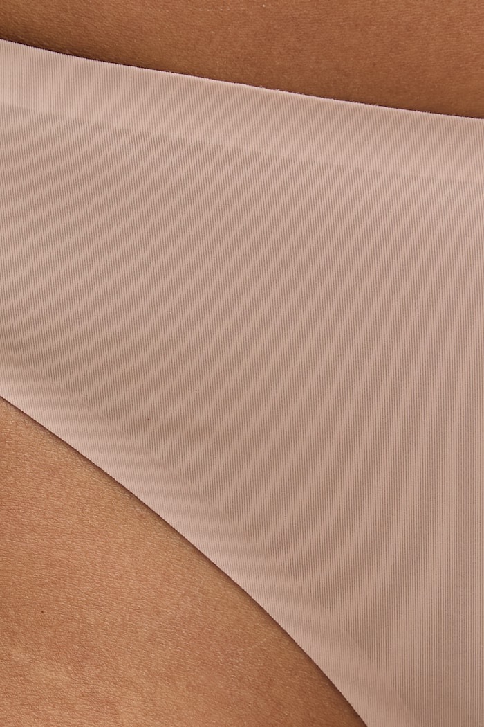 Calvin Klein Underwear stringi damskie beżowy LV00QF8587