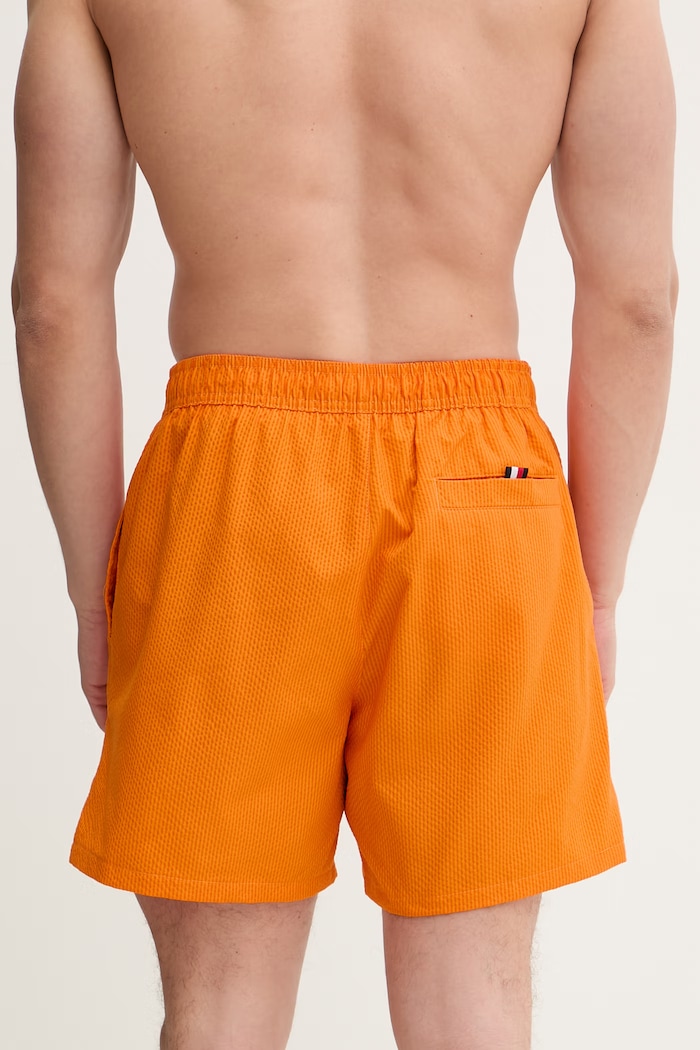 Oblečenie Tommy Hilfiger plavecké šortky pánske SUMMER UM0UM03857 oranžová