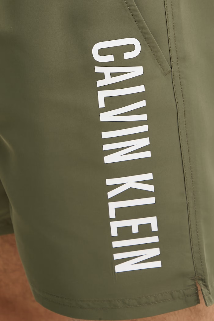 Calvin Klein plavecké šortky pánske zelená LV00N61047