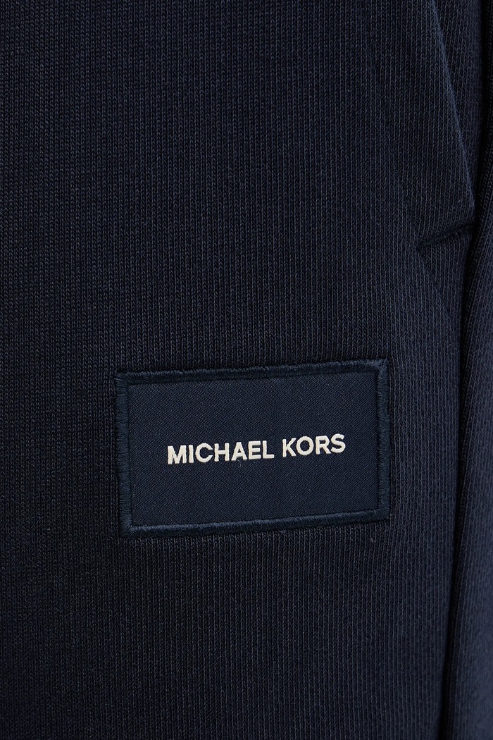 Bavlnené tepláky Michael Kors tmavomodrá CR652VFHC4