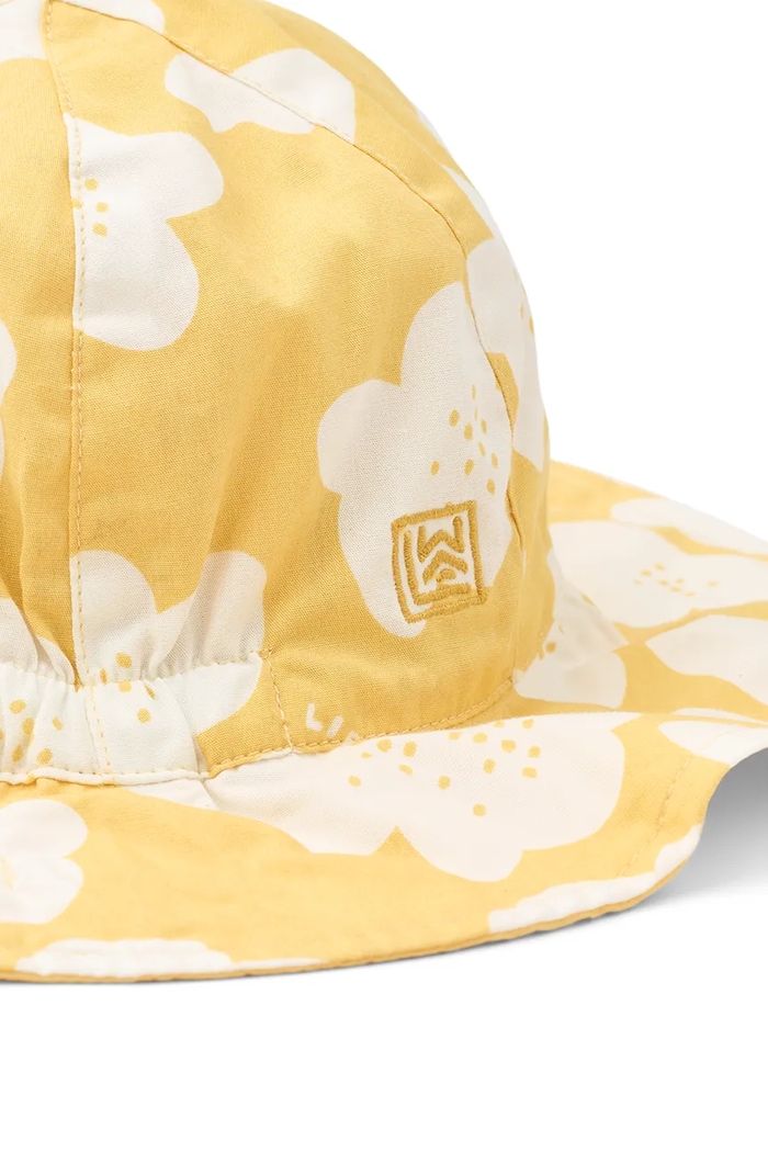 Bavlnená obojstranná detská čiapka Liewood Amelia Reversible Sun Hat žltá LW17697.PPY2