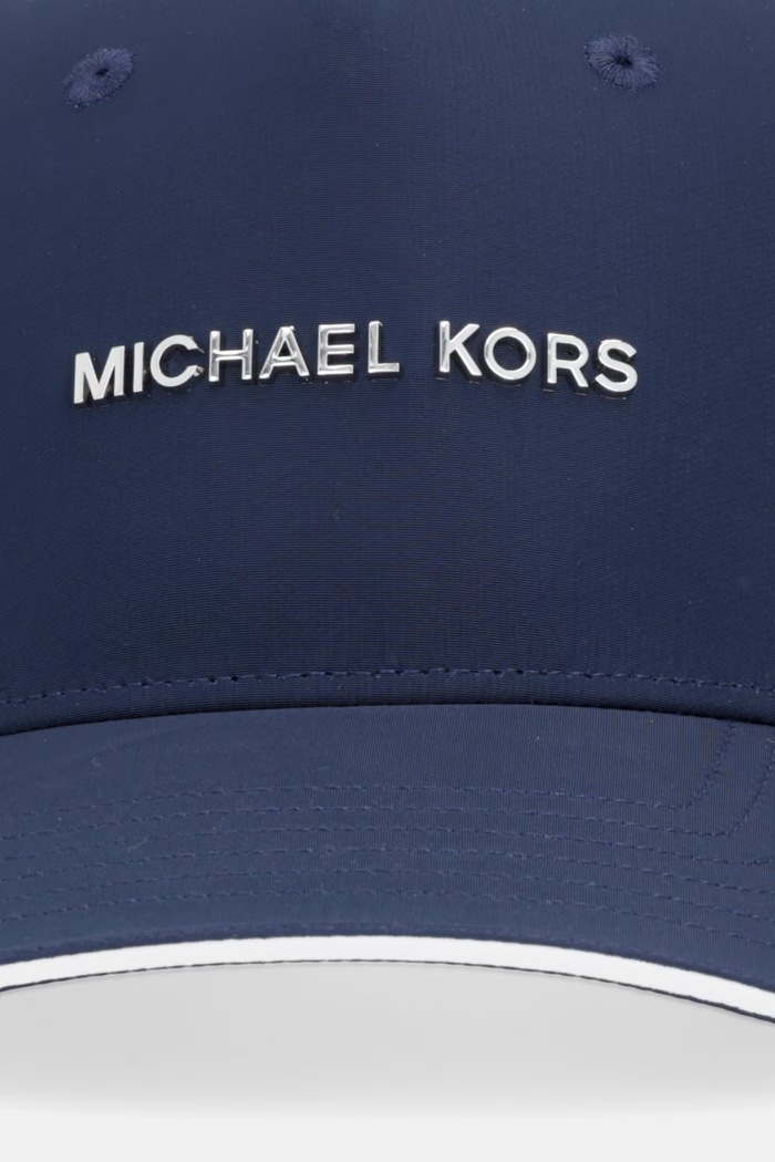 Kapa s šiltom Michael Kors CS6005IBB0 mornarsko modra SS26