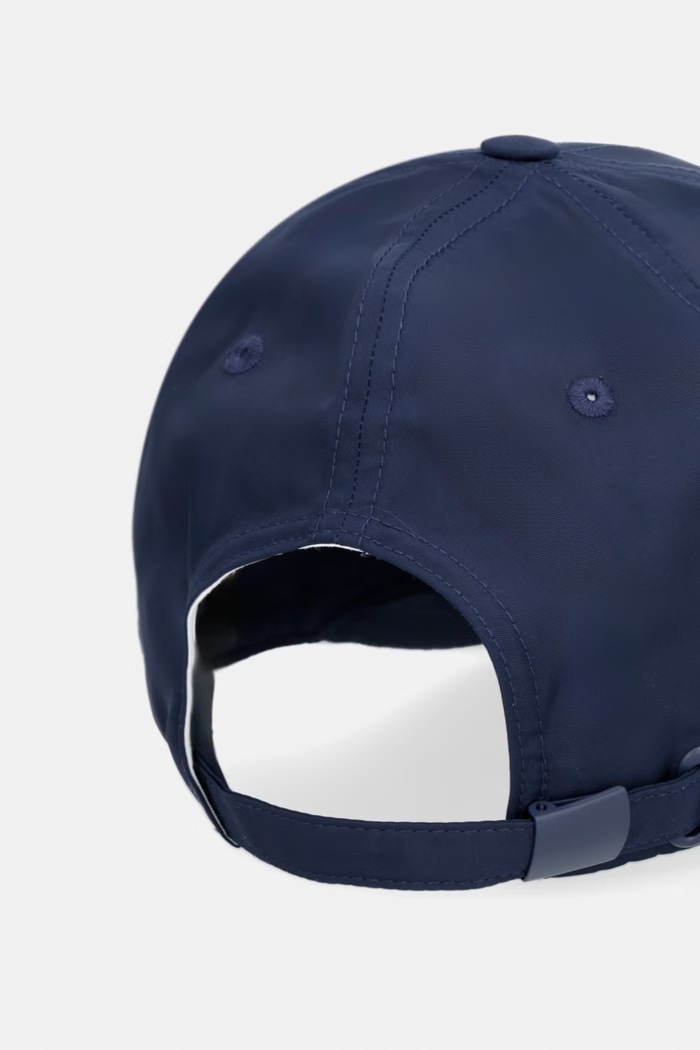 Dodatki Kapa s šiltom Michael Kors CS6005IBB0 mornarsko modra