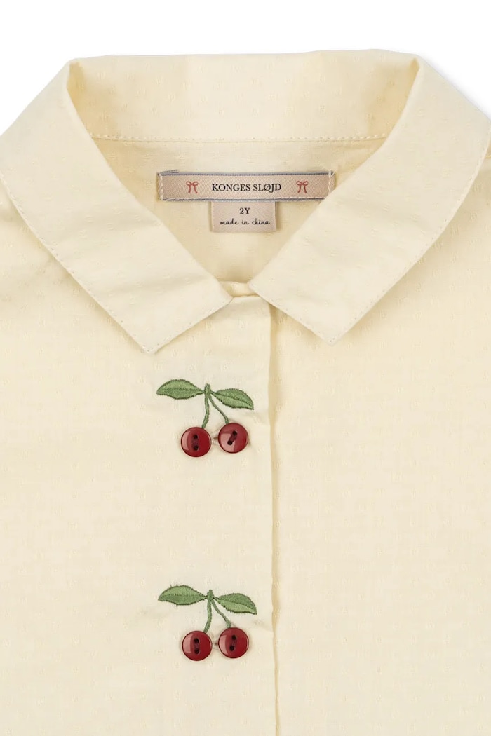 Detská bavlnená košeľa Konges Sløjd EVIA CHERRY SHIRT GOTS béžová KS104795.PPY2