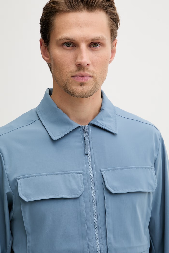 Helly Hansen μεταβατικό μπουφάν ανδρικό ESCAPE μπλε 54332.601