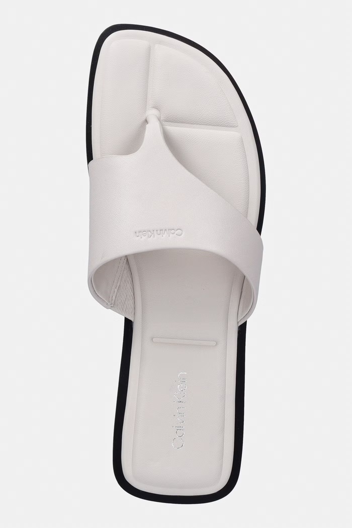 Calvin Klein šľapky dámske kožené FLAT SANDAL THONG LTH béžová HW0HW02866