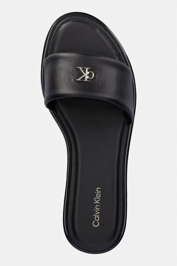 Calvin Klein klapki damskie skórzane ROUND FLAT SNDL LTH BAR HW 2 czarny HW0HW02925