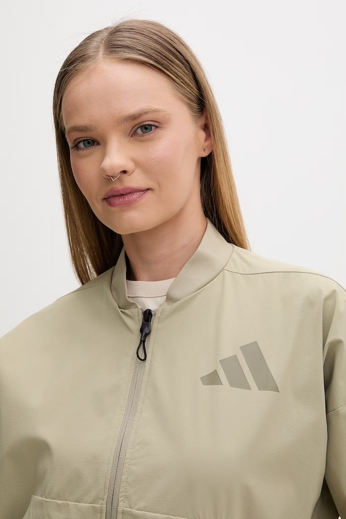 Îmbrăcăminte Adidas geacă bomber pentru femei x Z.N.E KD8509 verde