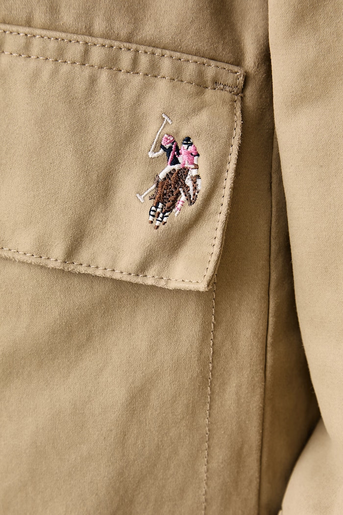 Krótka kurtka damska z bawełną WAXED STYLE SHORT U.S. Polo Assn. beżowy WUP2269