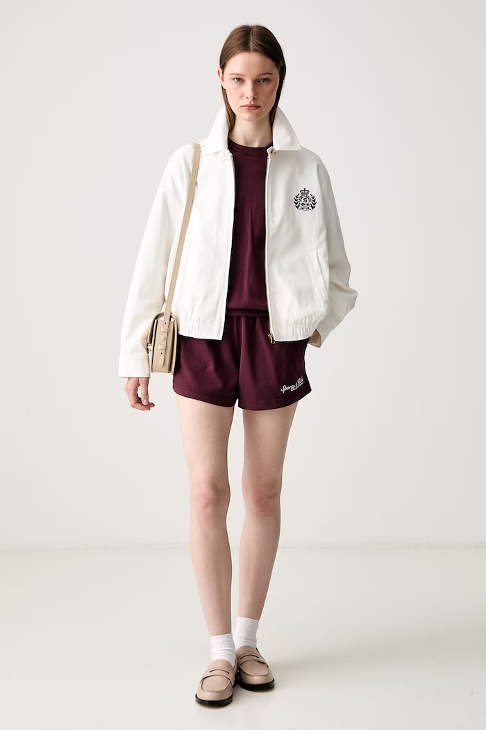 Sporty & Rich NY Crest kratka jakna za žene od pamuka OW02876243WH37