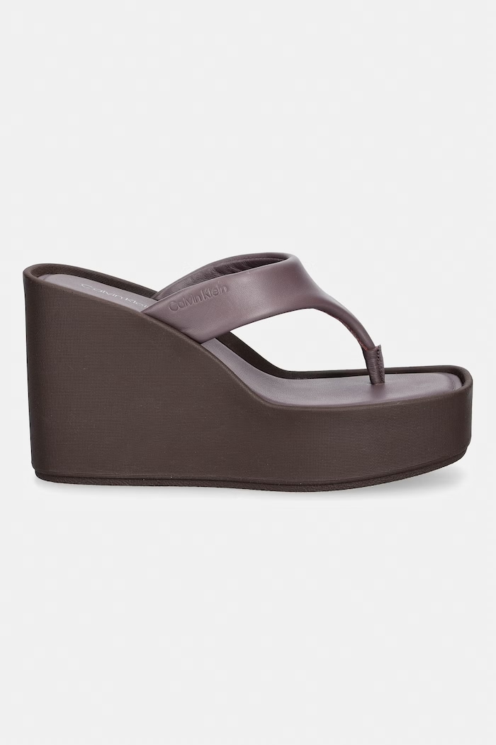 Calvin Klein japonki damskie skórzane WEDGE 70 SNDL THONG LTH HW0HW02880 brązowy SS26