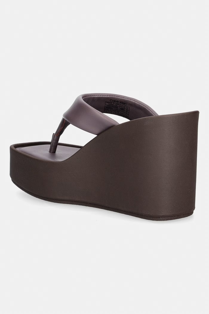 Obuwie Calvin Klein japonki damskie skórzane WEDGE 70 SNDL THONG LTH HW0HW02880 brązowy